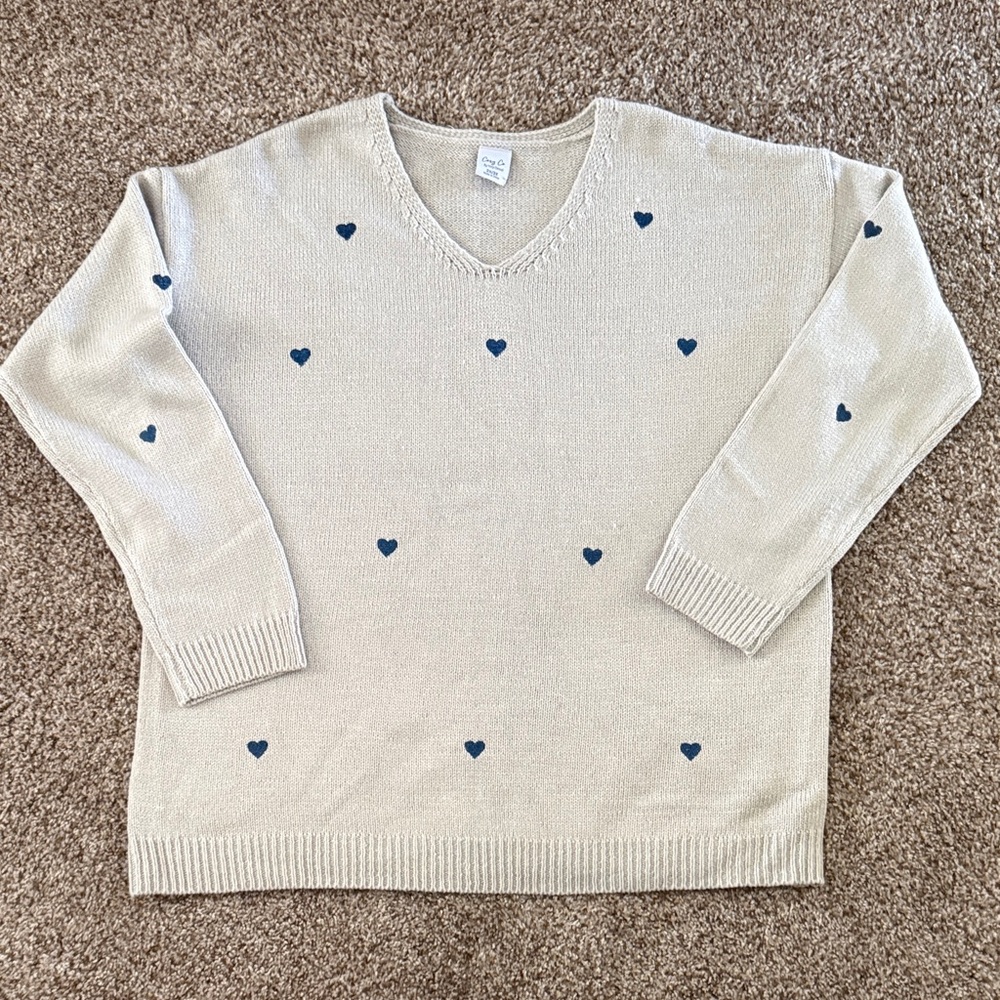 Cozy Casual Beige V-Neck Sweater with Blue Heart Details
